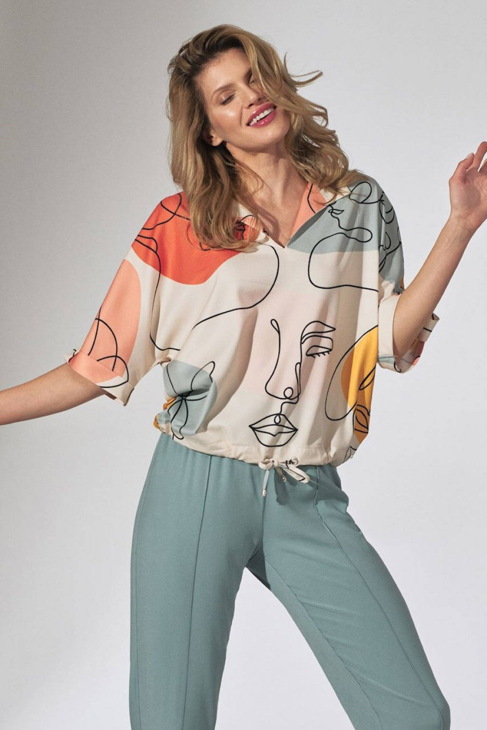 Abstract Faces Drawstring Blouse