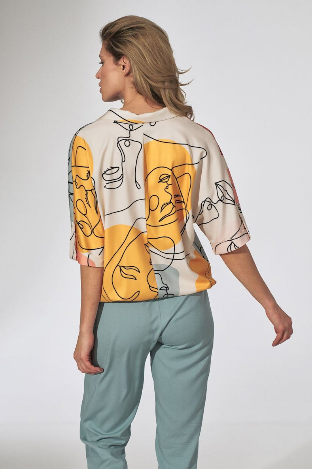 Abstract Faces Drawstring Blouse